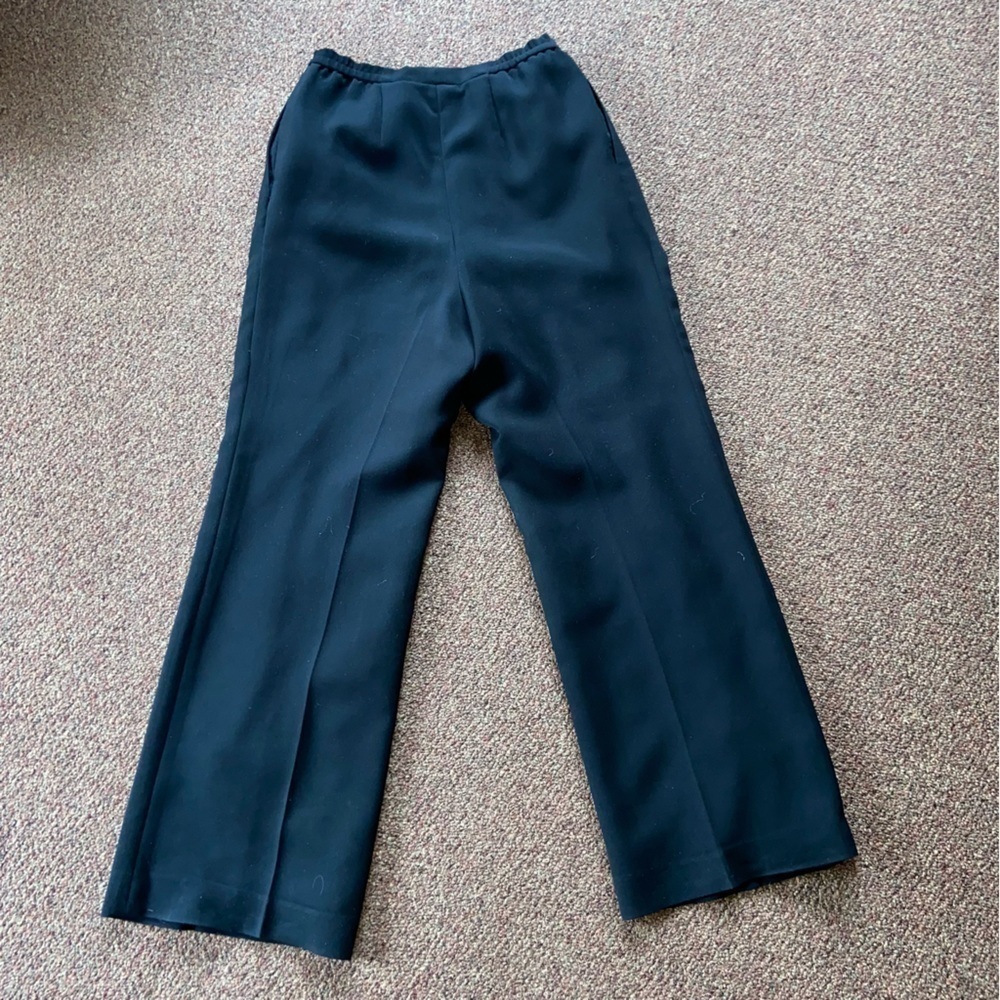 LE Suit trousers in midnight black with front pleats some elastic at the waist.